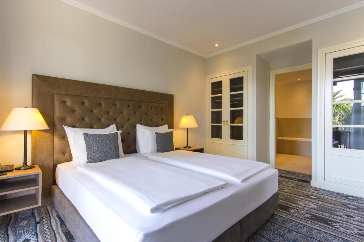 Cama o camas de una habitación en Lindner Hotel Mallorca Portals Nous, part of JdV by Hyatt