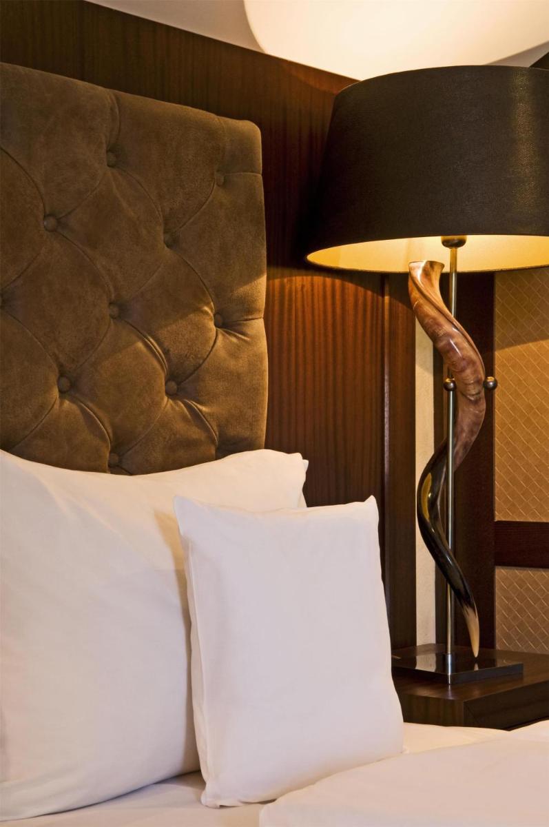 Cama o camas de una habitación en Lindner Hotel Mallorca Portals Nous, part of JdV by Hyatt