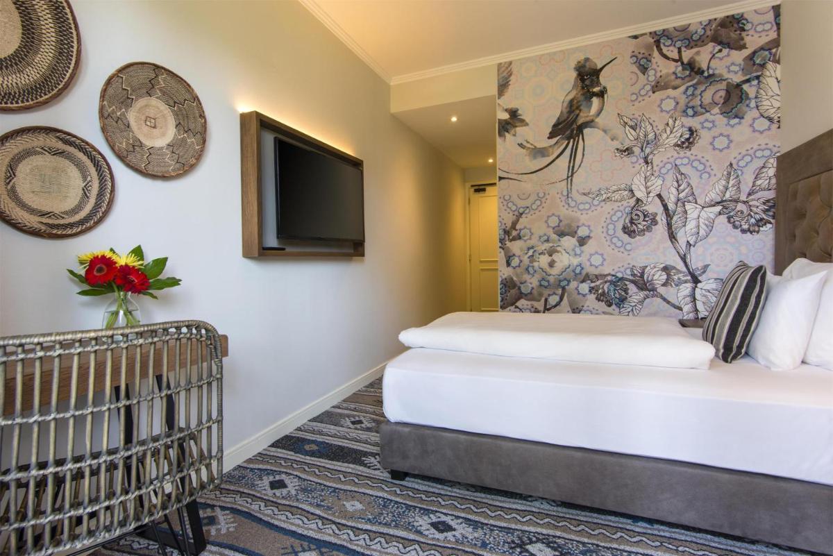 Cama o camas de una habitación en Lindner Hotel Mallorca Portals Nous, part of JdV by Hyatt