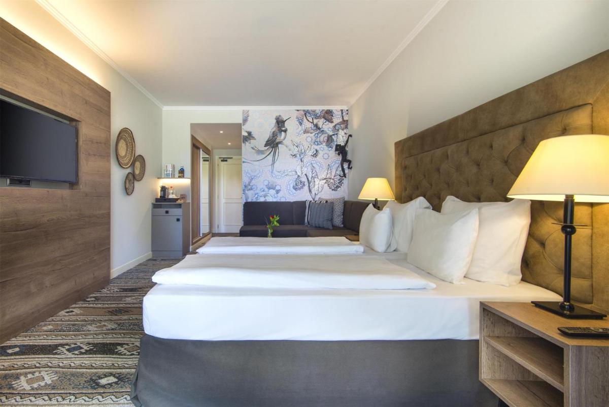 Cama o camas de una habitación en Lindner Hotel Mallorca Portals Nous, part of JdV by Hyatt