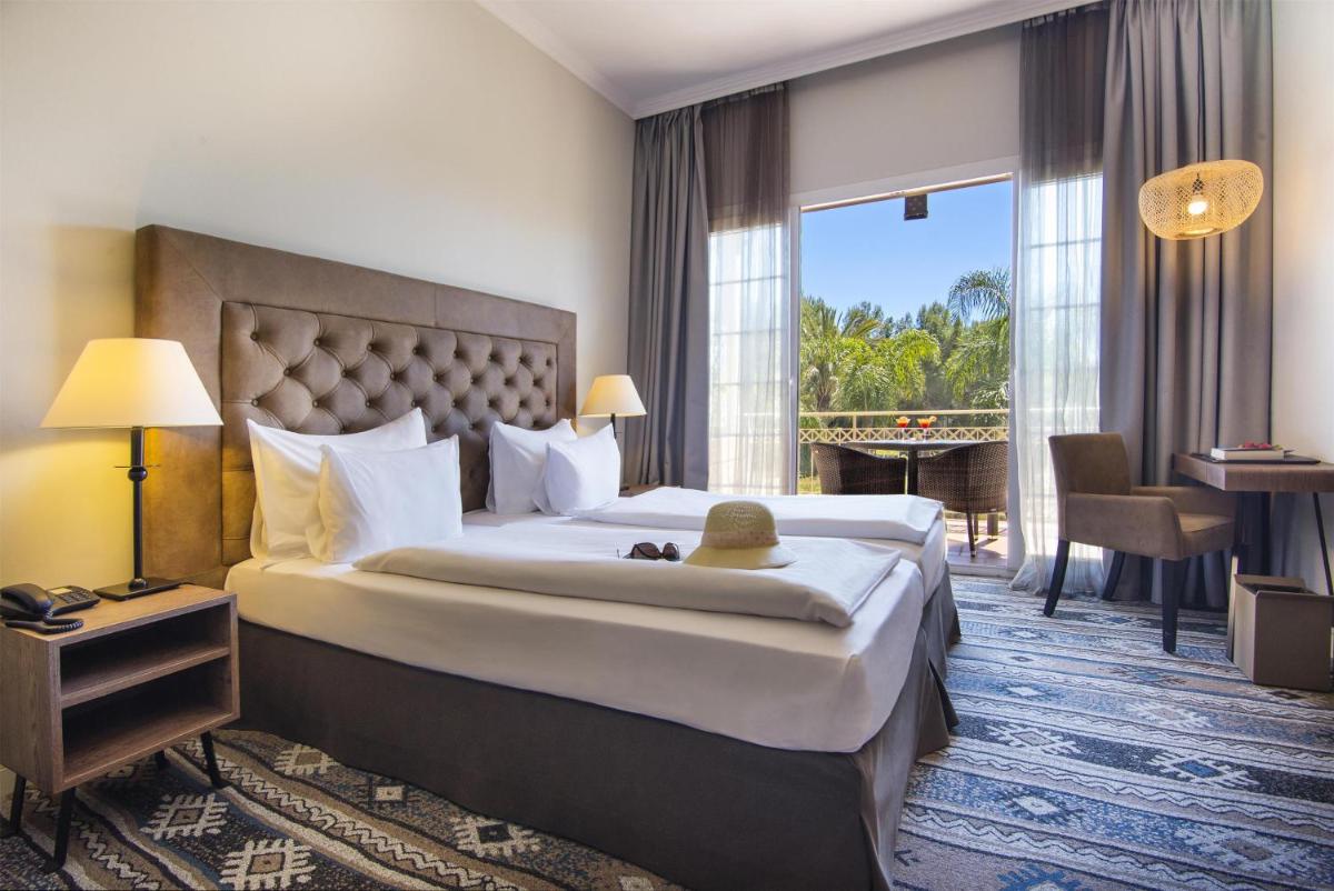 Cama o camas de una habitación en Lindner Hotel Mallorca Portals Nous, part of JdV by Hyatt