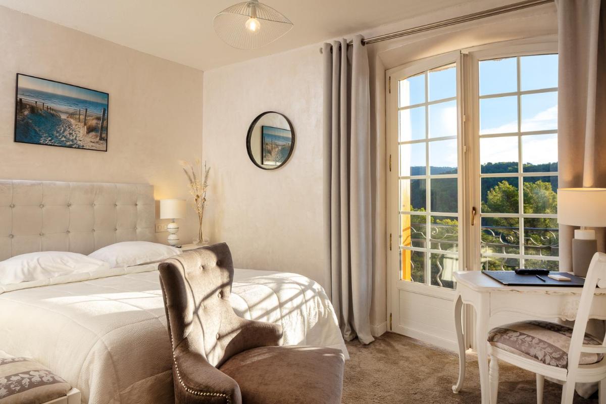 Un ou plusieurs lits dans un hébergement de l'établissement La Bastide De Tourtour Hotel & Spa
