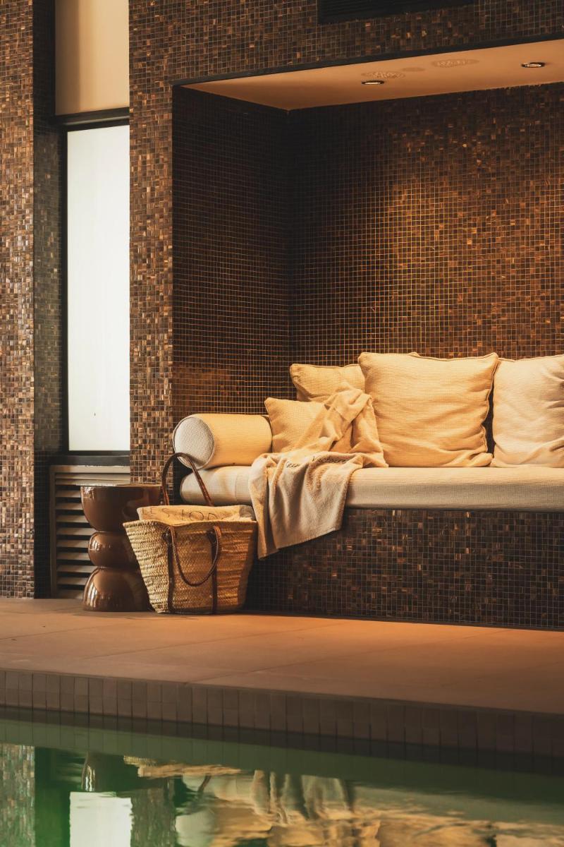 Coin salon dans l'établissement Les Lodges Sainte-Victoire Hotel & Spa