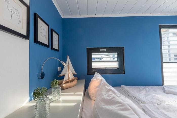 Ein Bett oder Betten in einem Zimmer der Unterkunft Schwimmende Häuser im BALTIC SEA RESORT