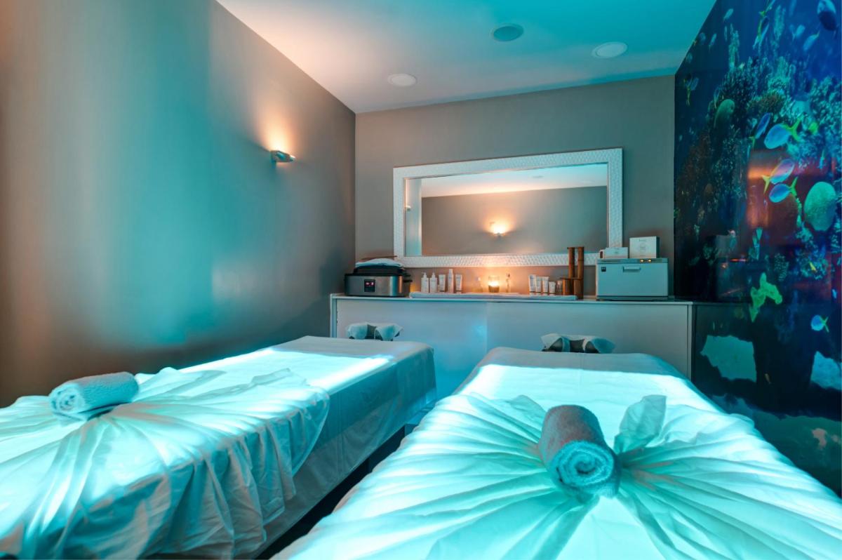 Uma cama ou camas num quarto em Hotel Do Caracol