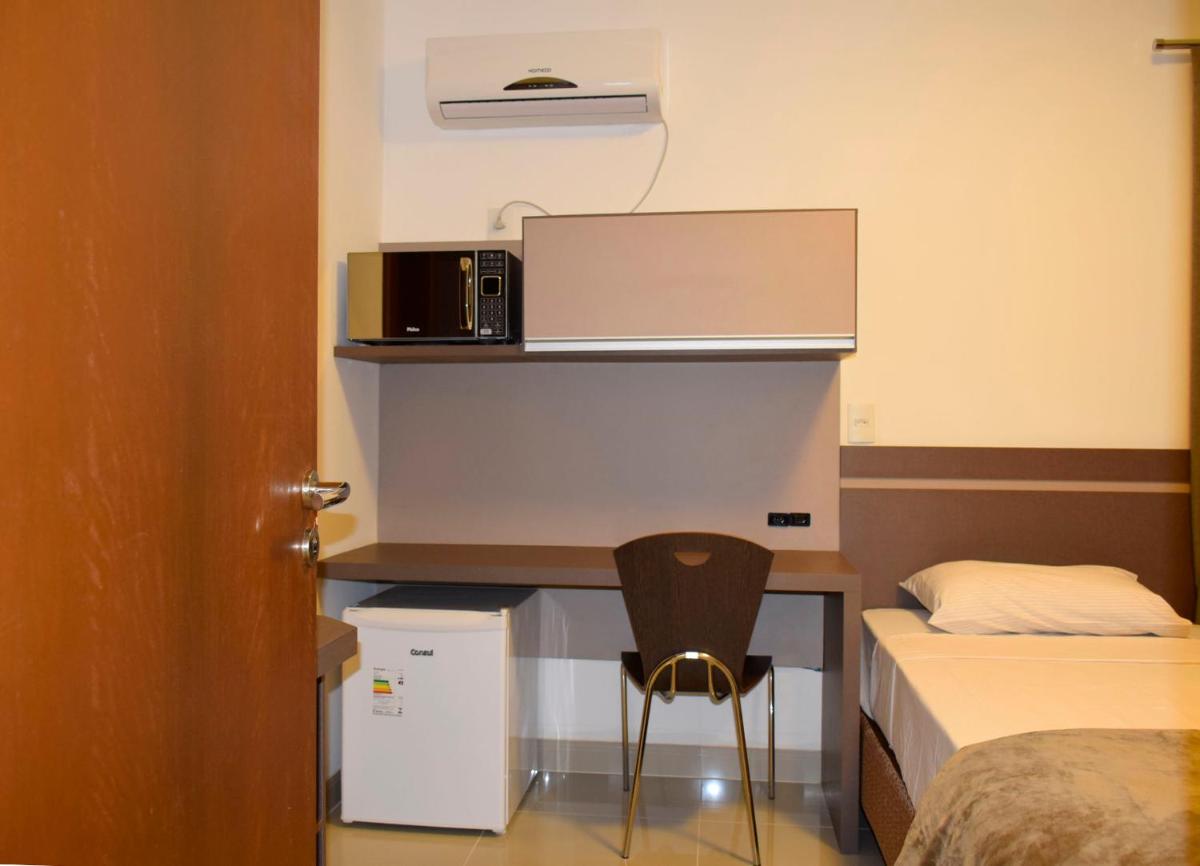Suítes Trindade - Housity