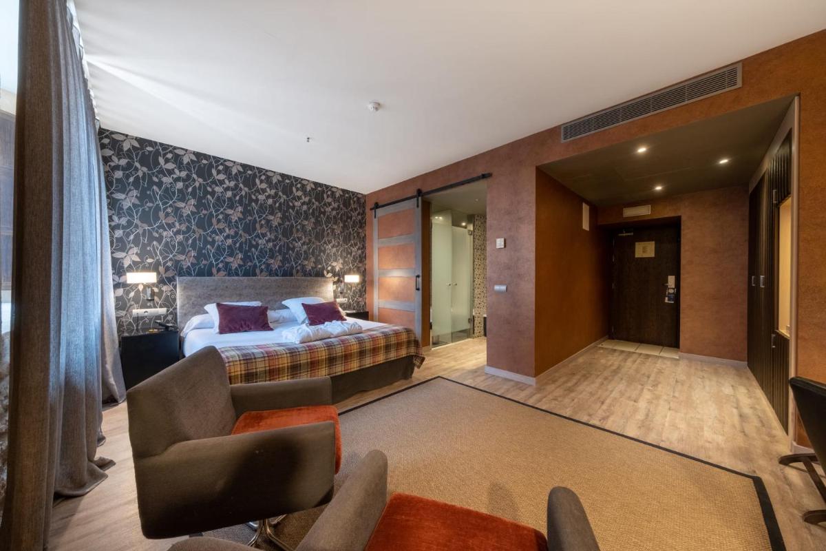 Cama o camas de una habitación en Castilla Termal Burgo de Osma