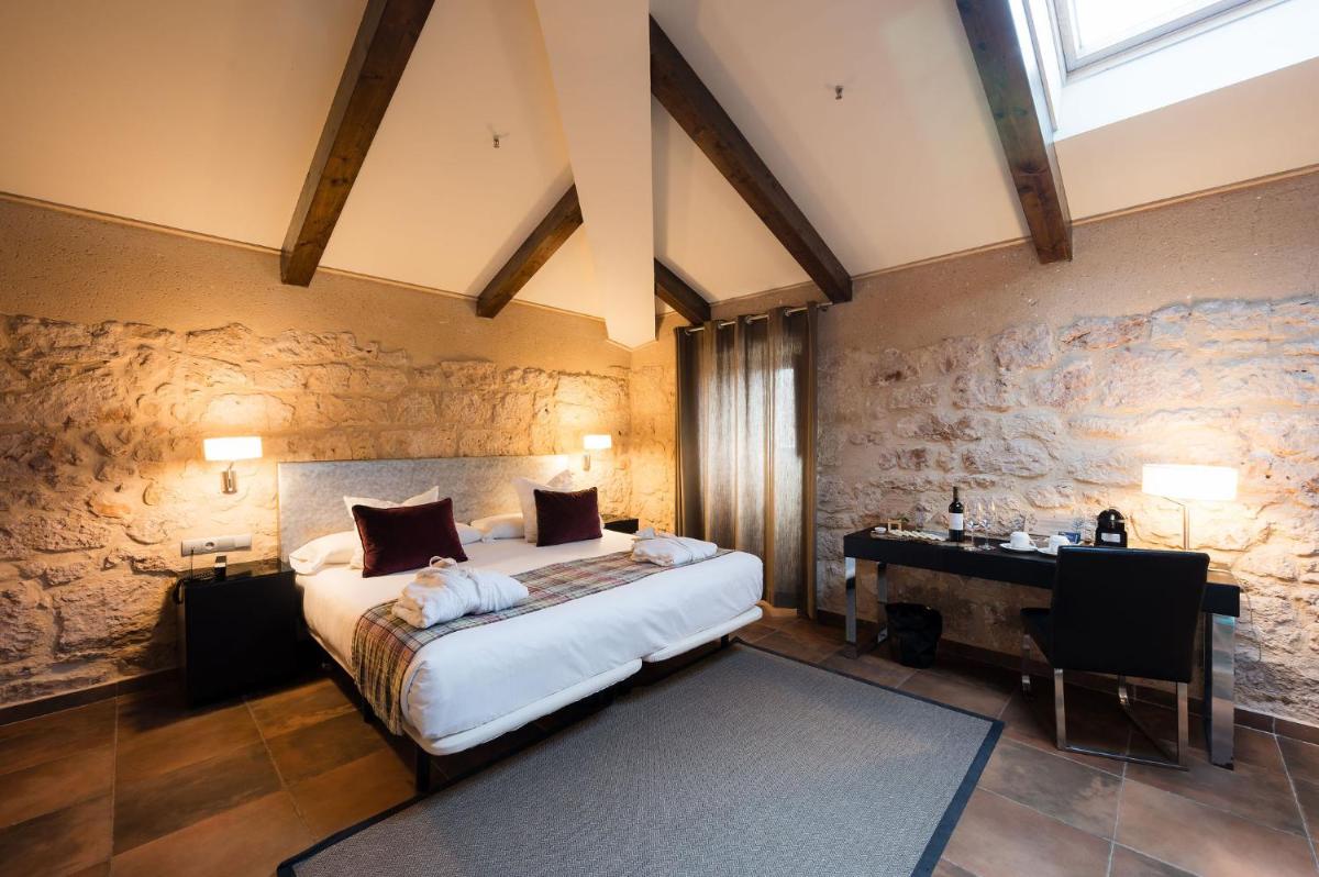 Cama o camas de una habitación en Castilla Termal Burgo de Osma