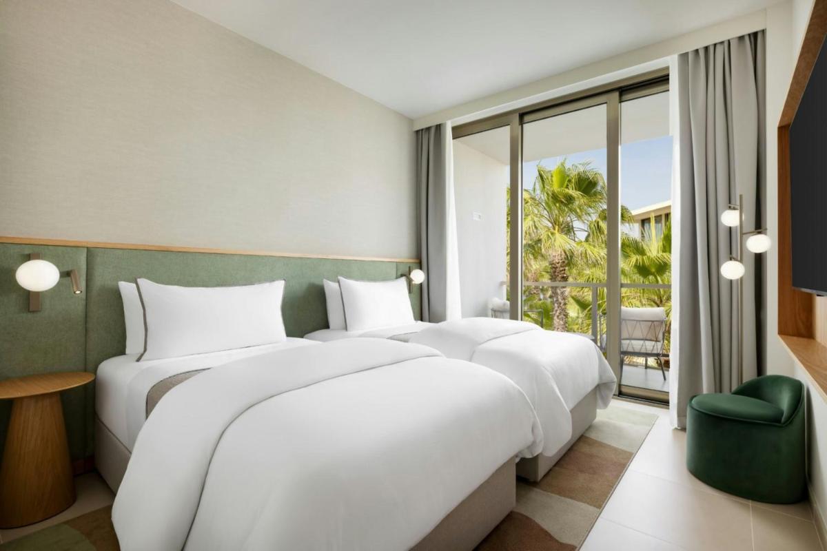 Uma cama ou camas num quarto em The Westin Salgados Beach Resort, Algarve