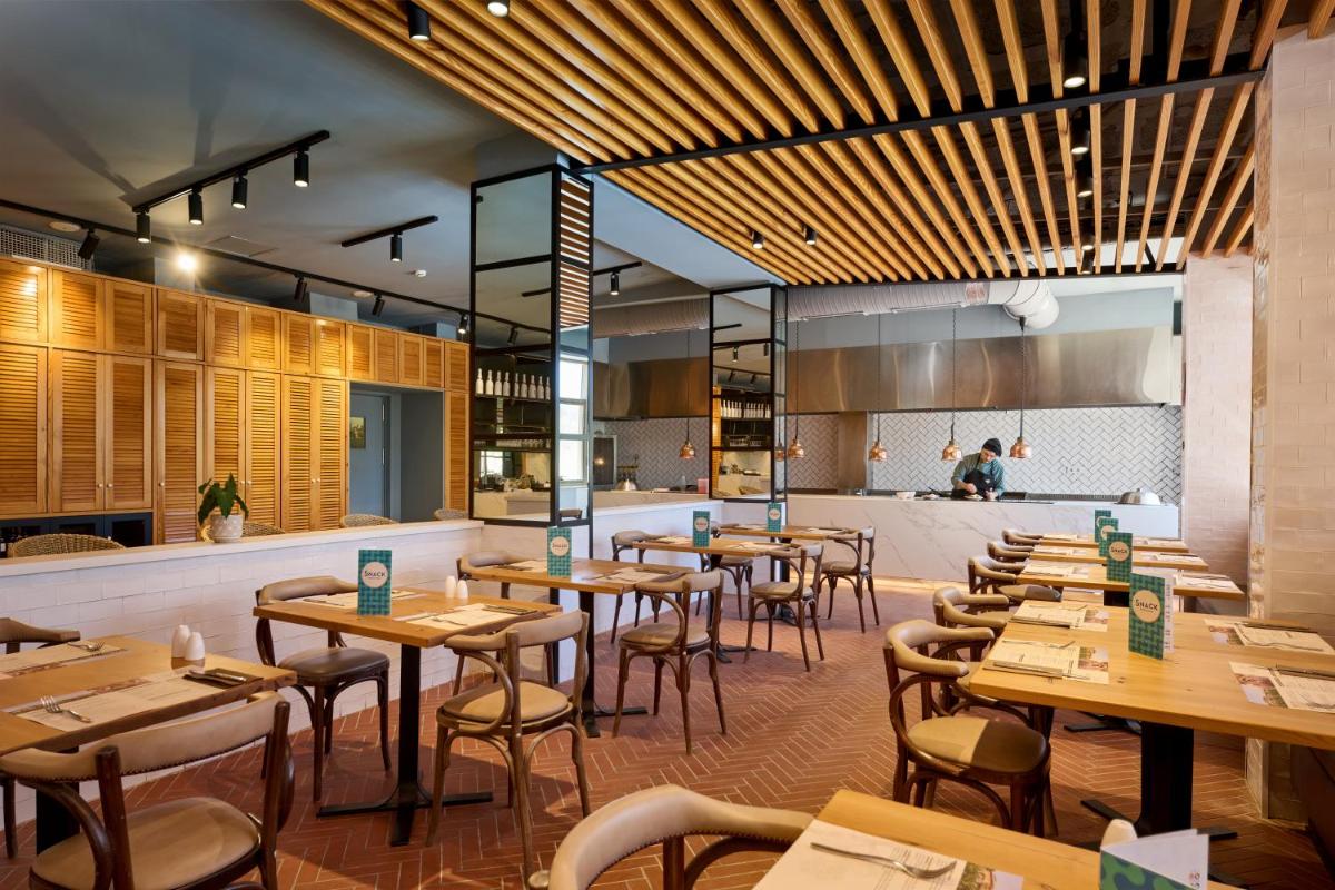 Un restaurante o sitio para comer en Grupotel Cala Marsal Nature Hotel - New Reopening 2025