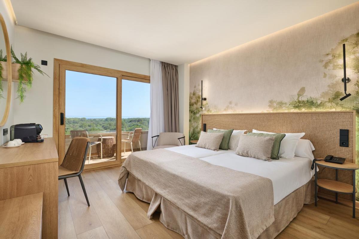 Cama o camas de una habitación en Grupotel Cala Marsal Nature Hotel - New Reopening 2025