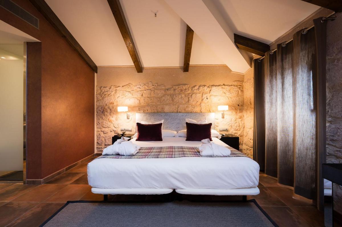 Cama o camas de una habitación en Castilla Termal Burgo de Osma