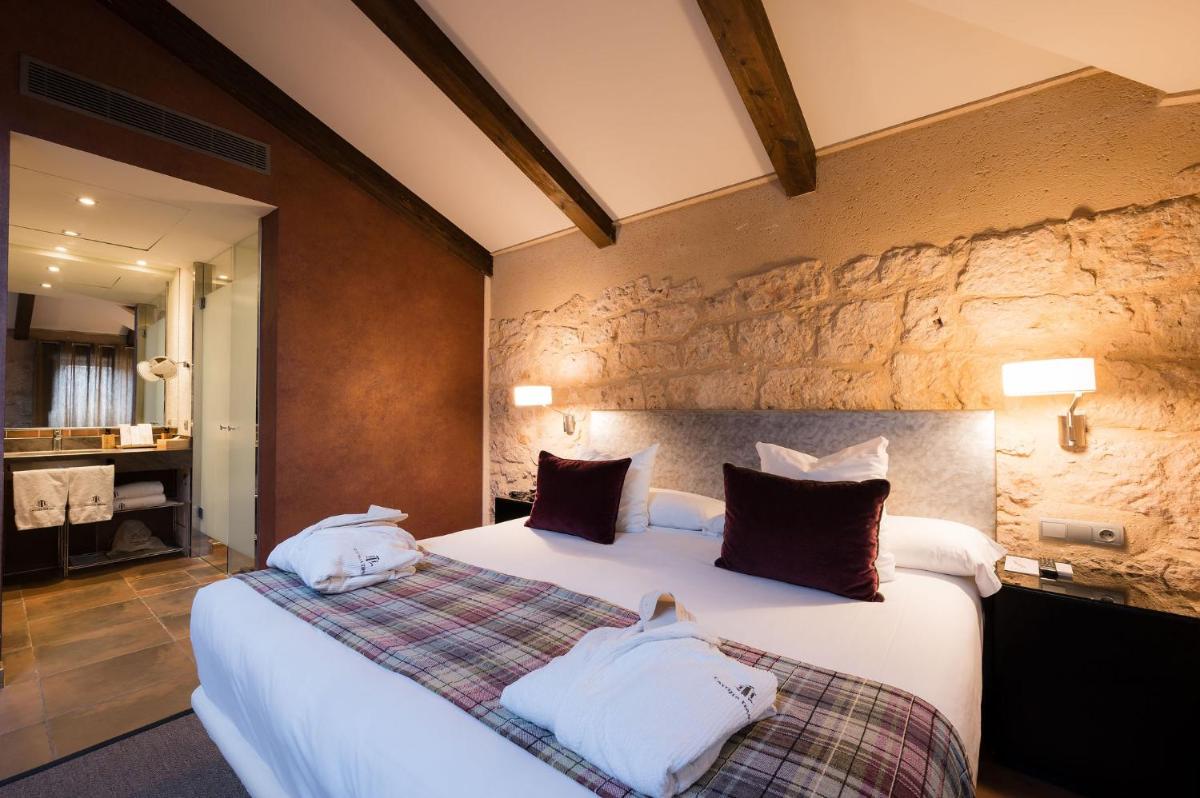 Cama o camas de una habitación en Castilla Termal Burgo de Osma