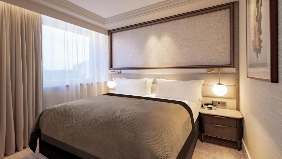 Ein Bett oder Betten in einem Zimmer der Unterkunft InterContinental Berlin by IHG
