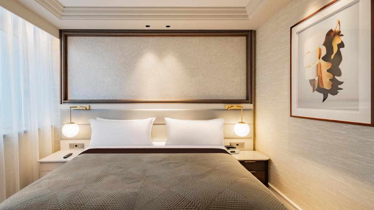 Ein Bett oder Betten in einem Zimmer der Unterkunft InterContinental Berlin by IHG