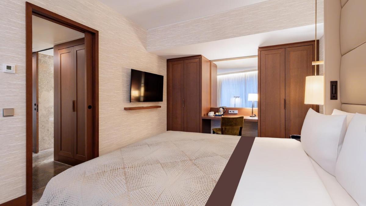 Ein Bett oder Betten in einem Zimmer der Unterkunft InterContinental Berlin by IHG