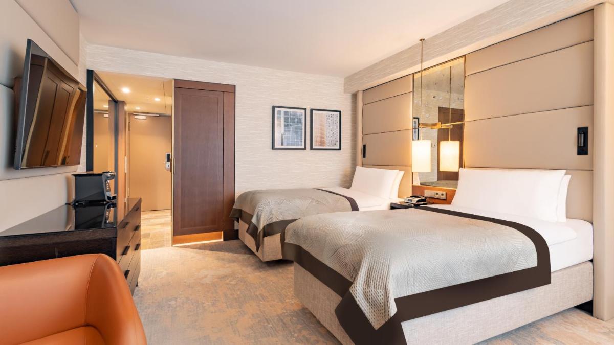 Ein Bett oder Betten in einem Zimmer der Unterkunft InterContinental Berlin by IHG