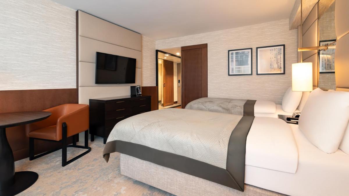Ein Bett oder Betten in einem Zimmer der Unterkunft InterContinental Berlin by IHG