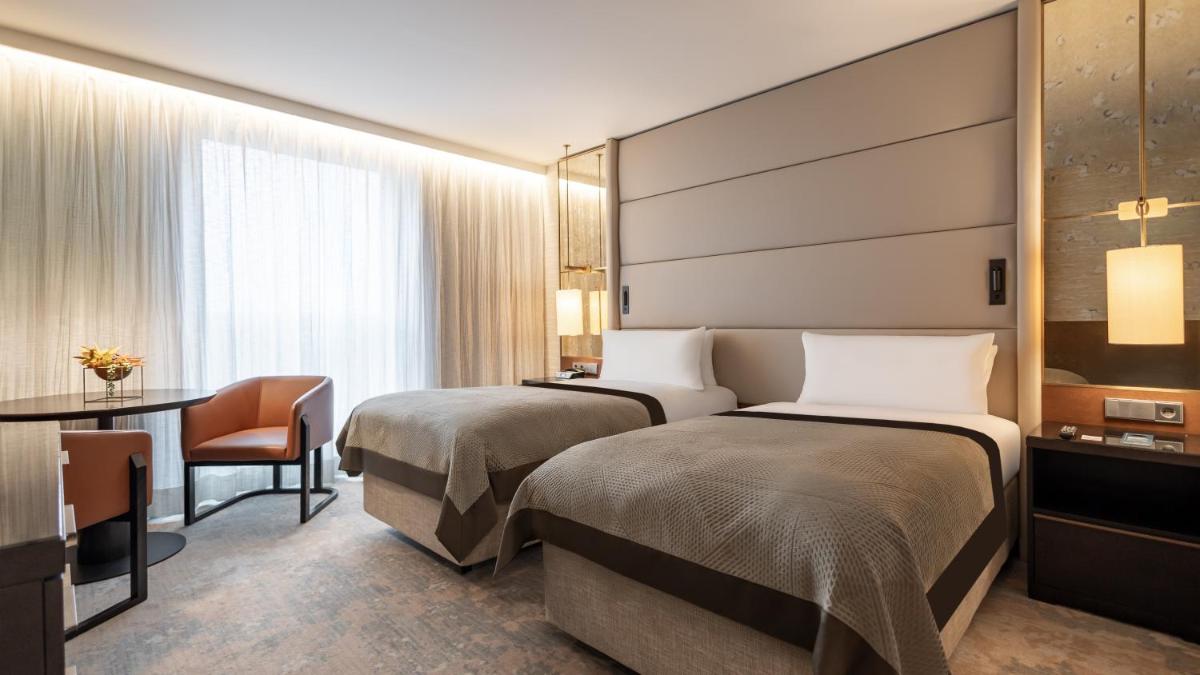 Ein Bett oder Betten in einem Zimmer der Unterkunft InterContinental Berlin by IHG