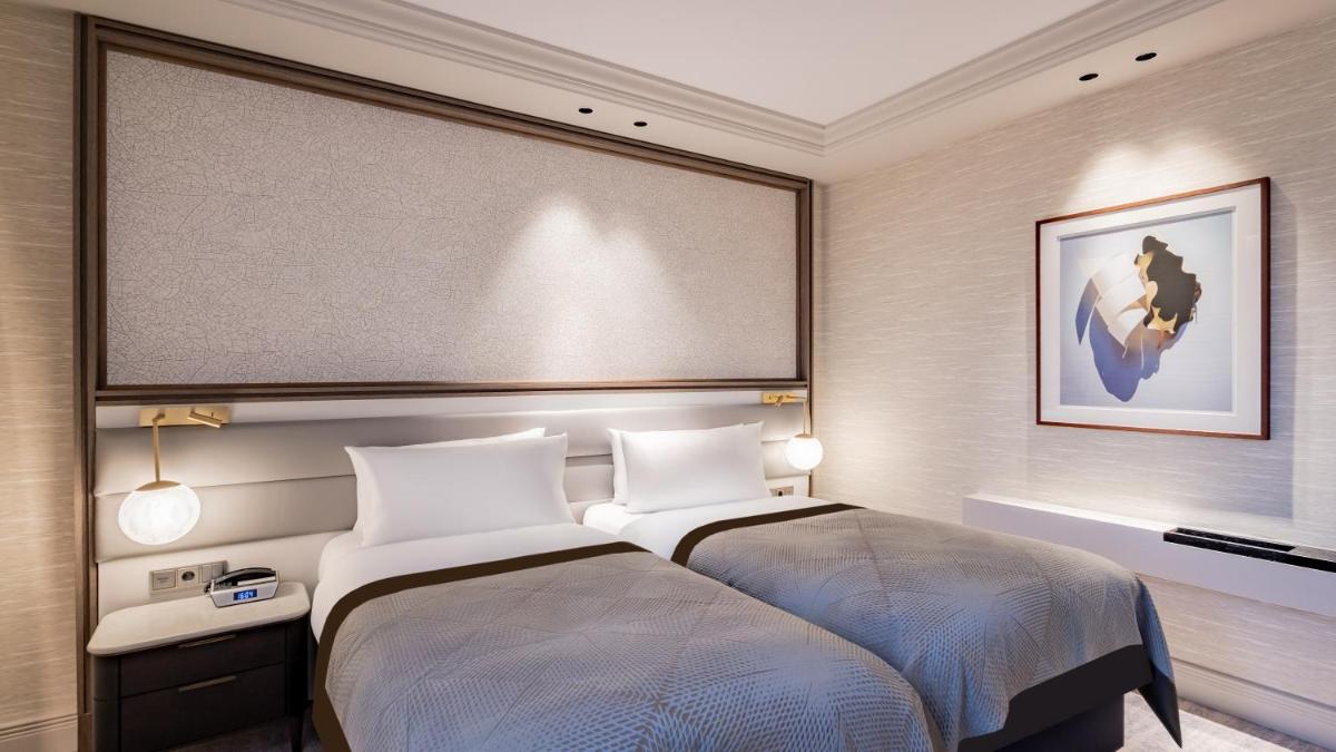 Ein Bett oder Betten in einem Zimmer der Unterkunft InterContinental Berlin by IHG