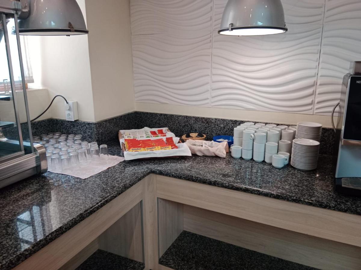 Una cocina o zona de cocina en Hotel Palacio de Oñate