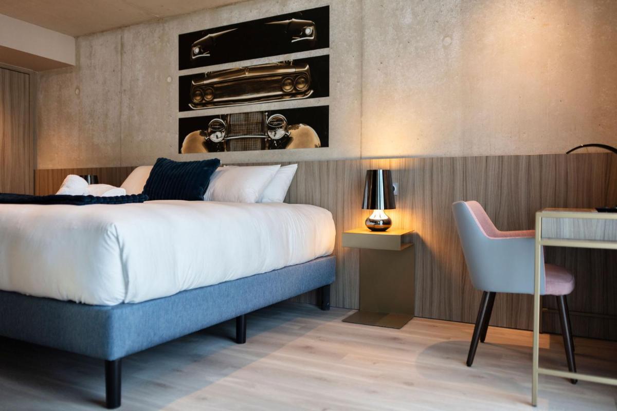 Un ou plusieurs lits dans un hébergement de l'établissement Ki Space Hotel & Spa - near Disneyland Paris