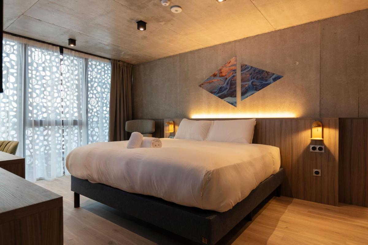 Un ou plusieurs lits dans un hébergement de l'établissement Ki Space Hotel & Spa - near Disneyland Paris