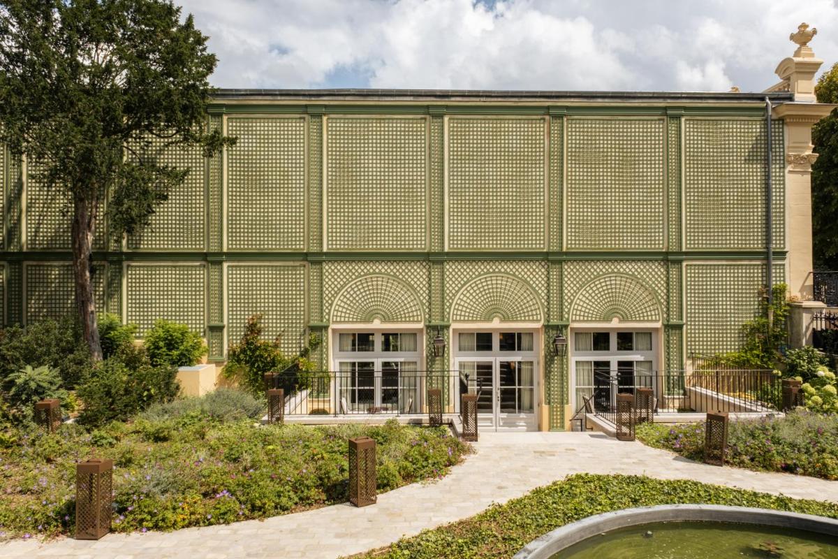 Jardin de l'établissement Hôtel Les Lumières - Relais & Châteaux