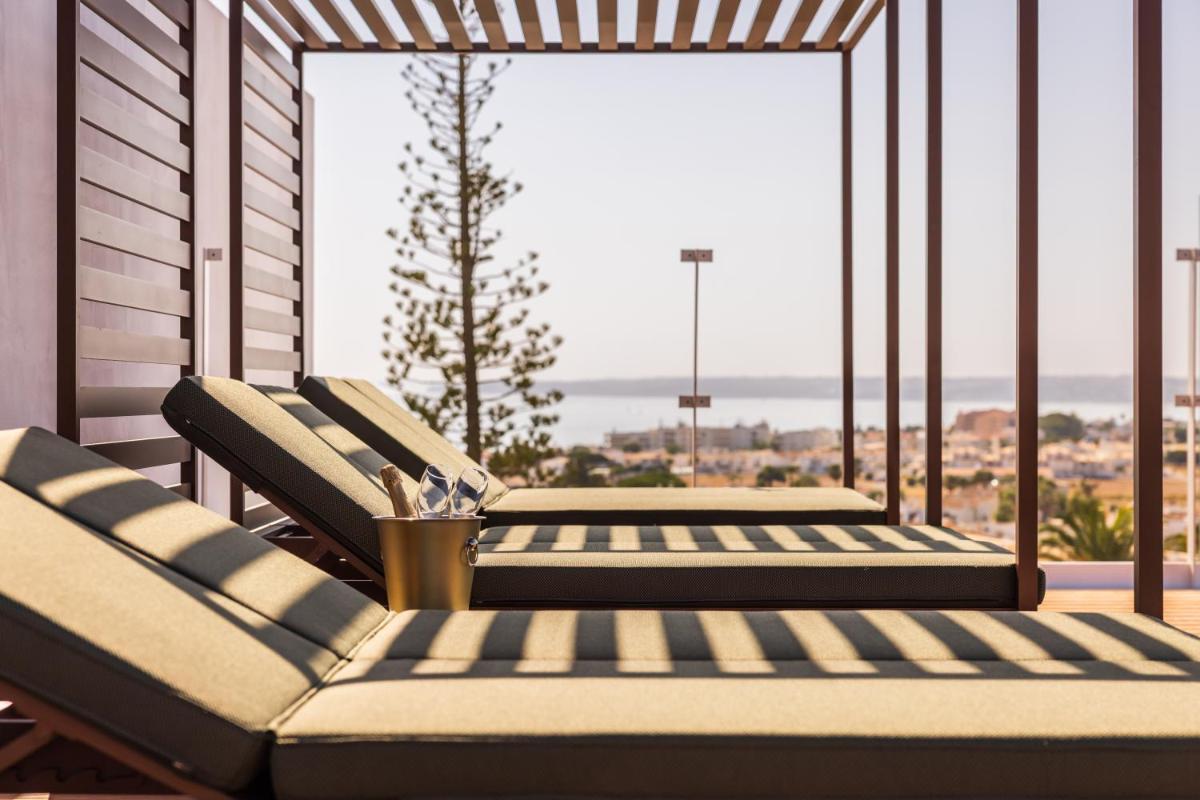 Uma varanda ou terraço em Castelo Suites Hotel