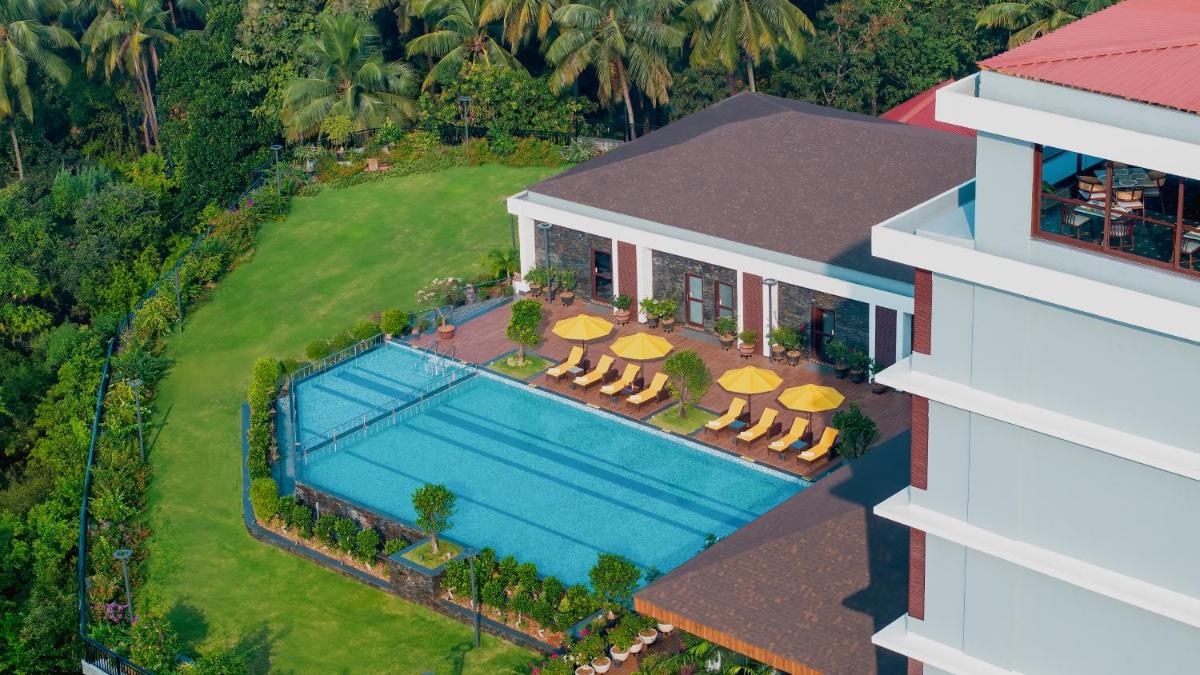 an aerial view of a house with a swimming pool at Gateway Goa, Palolem in Palolem