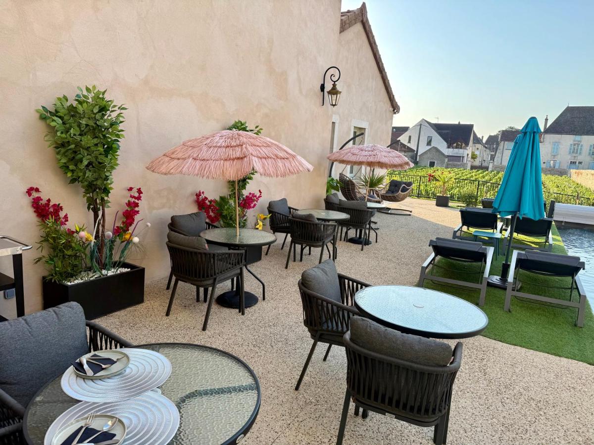 Coin salon dans l'établissement Les Rêveries du Clos POMMARD Vignes & SPA& Dégustation