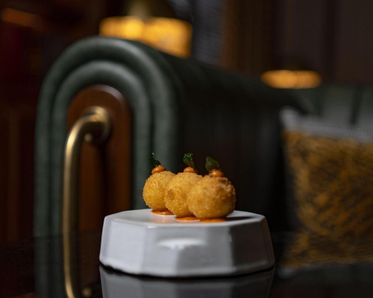 a piece of food sitting on top of a table at Hyatt Centric Sector17 Chandigarh in Chandīgarh