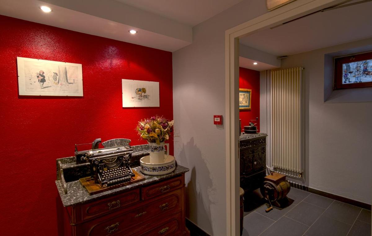 Cuisine ou kitchenette dans l'établissement Hôtel Restaurant et Spa Au Tilleul
