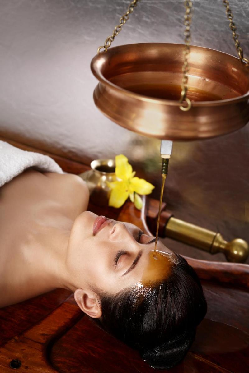 a woman is getting a bath with a spaificialificialificialificialificialificialificial at The Taj Mahal Tower, Mumbai in Mumbai a woman is getting a bath with a spaificialificialificialificialificialificialificial at The Taj Mahal Tower, Mumbai in Mumbai