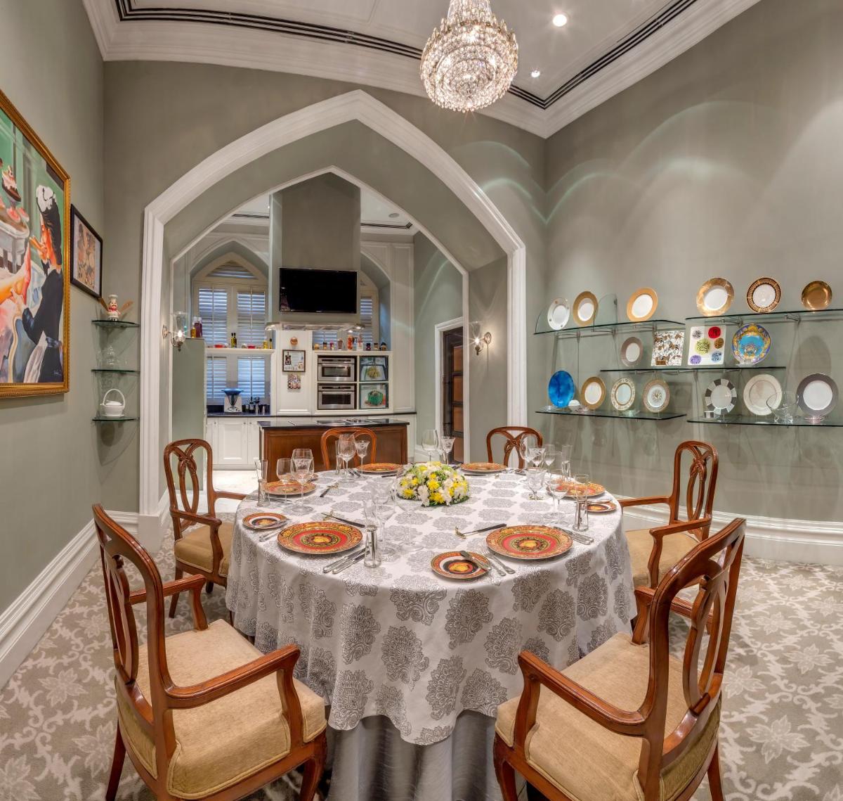 a dining room with a table and chairs at The Taj Mahal Tower, Mumbai in Mumbai a dining room with a table and chairs at The Taj Mahal Tower, Mumbai in Mumbai