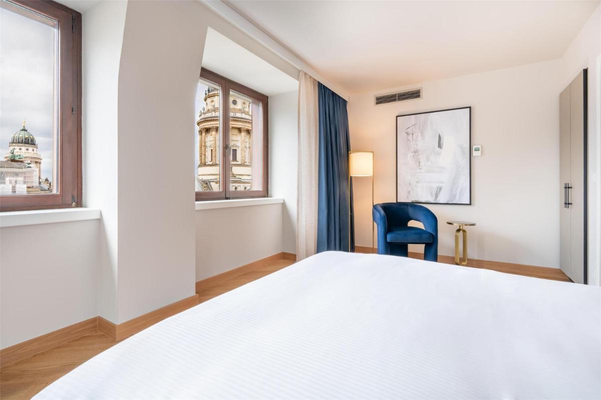 Ein Bett oder Betten in einem Zimmer der Unterkunft Hilton Berlin