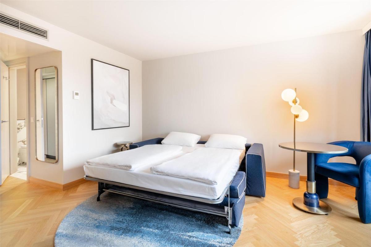 Ein Bett oder Betten in einem Zimmer der Unterkunft Hilton Berlin