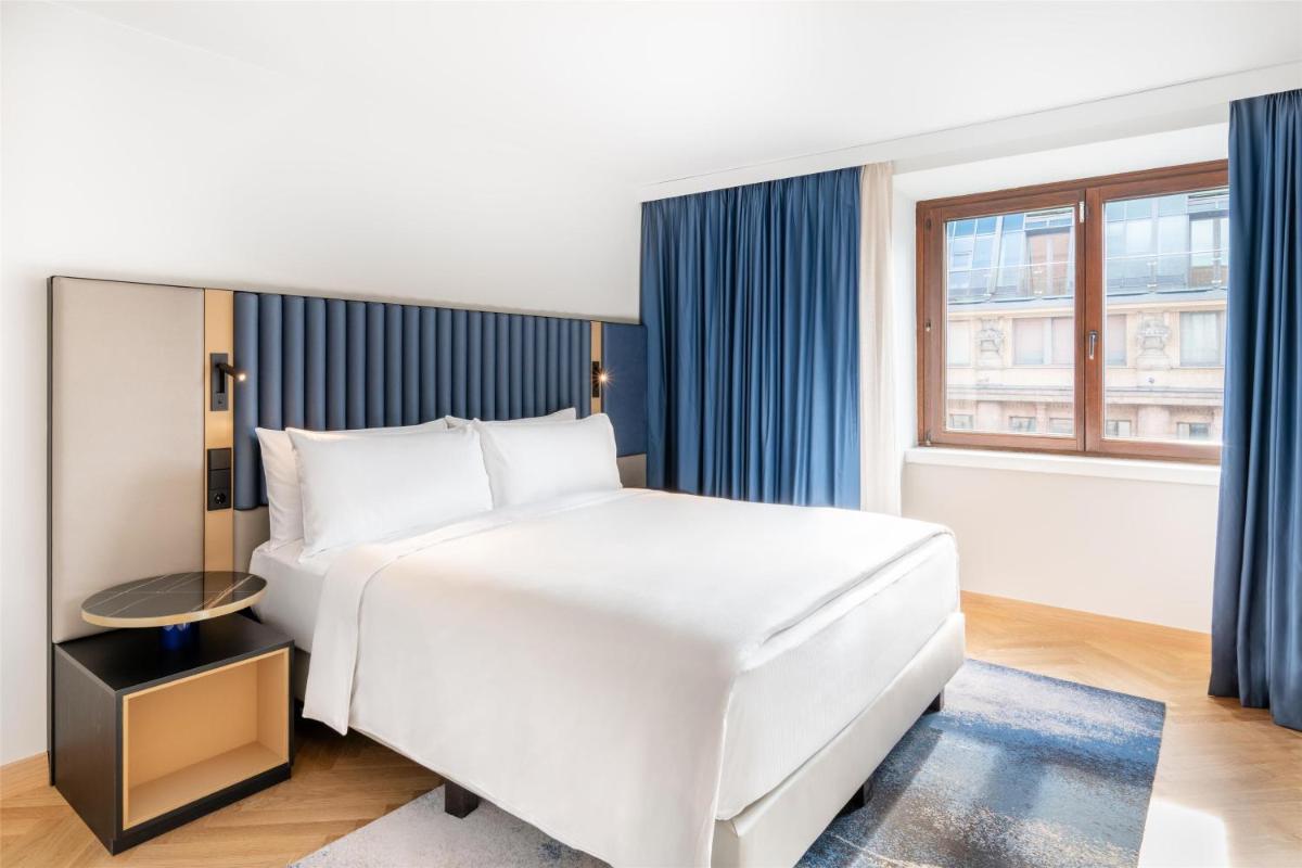 Ein Bett oder Betten in einem Zimmer der Unterkunft Hilton Berlin