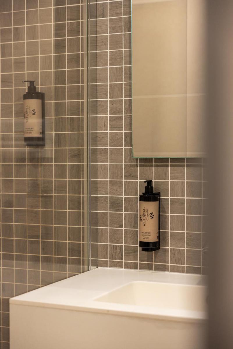 Salle de bains dans l'établissement Hôtel & Spa Vitalparc, The Originals Collection