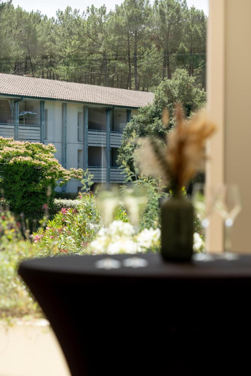 Jardin de l'établissement Hôtel & Spa Vitalparc, The Originals Collection