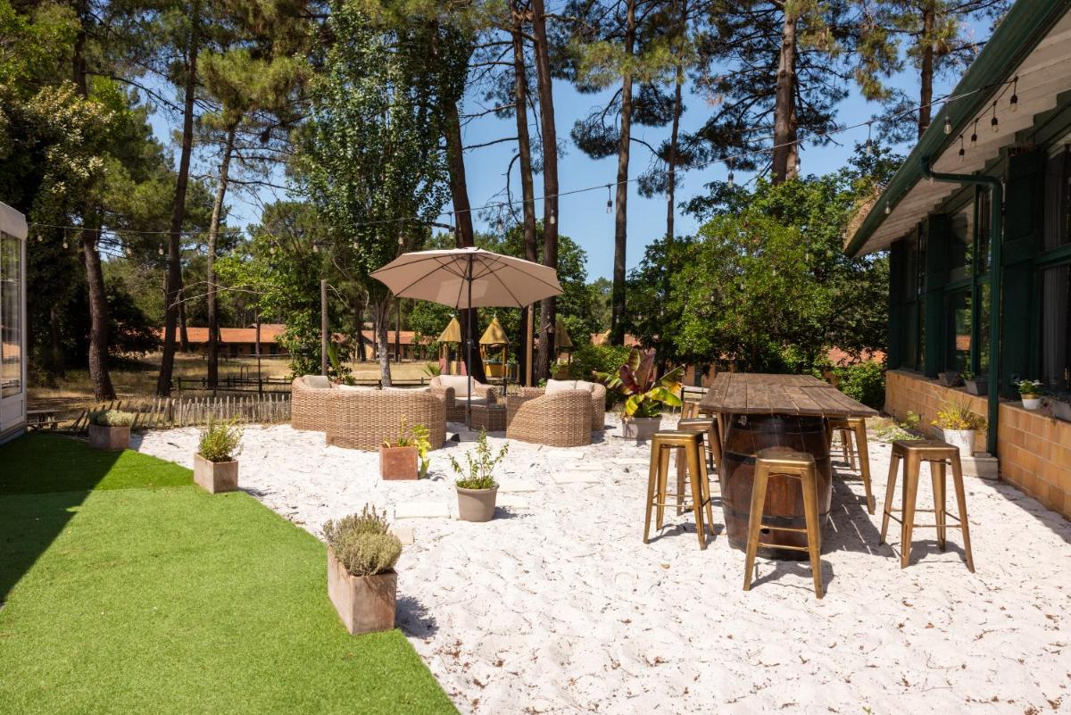 Jardin de l'établissement Hôtel & Spa Vitalparc, The Originals Collection