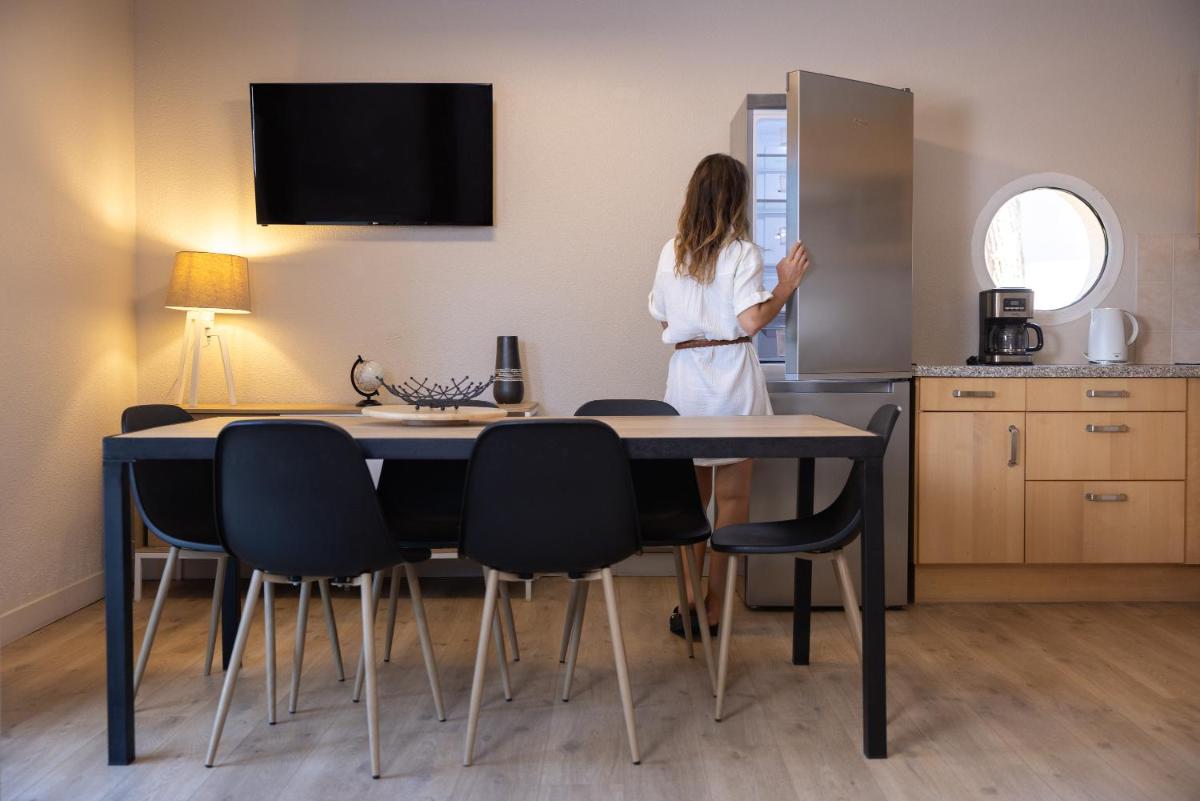 Cuisine ou kitchenette dans l'établissement Hôtel & Spa Vitalparc, The Originals Collection