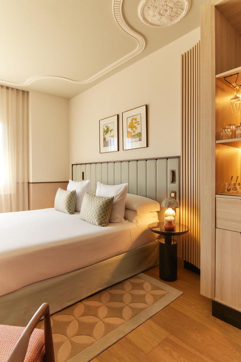 Cama o camas de una habitación en Grand Hotel Central, Small Luxury Hotels