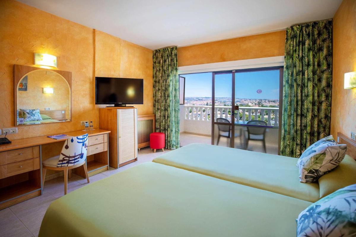 Cama o camas de una habitación en Hotel Servigroup La Zenia 4 Sup