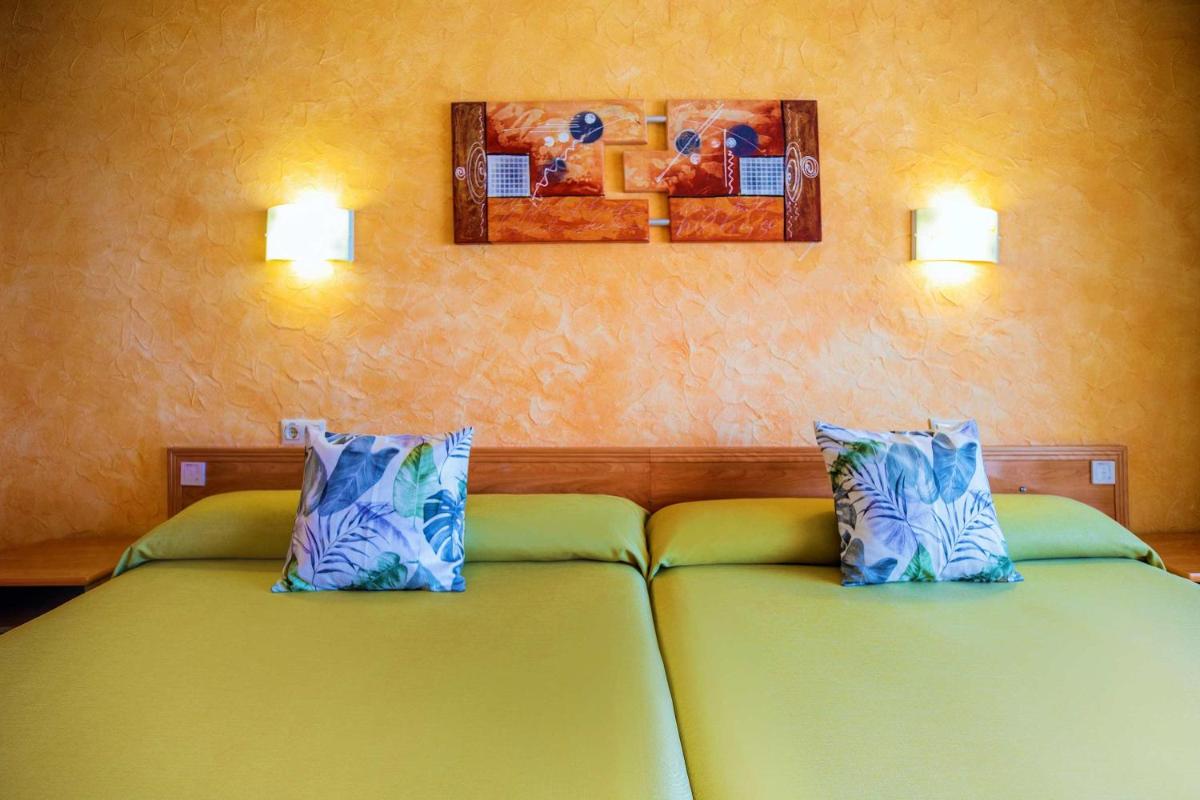 Cama o camas de una habitación en Hotel Servigroup La Zenia 4 Sup