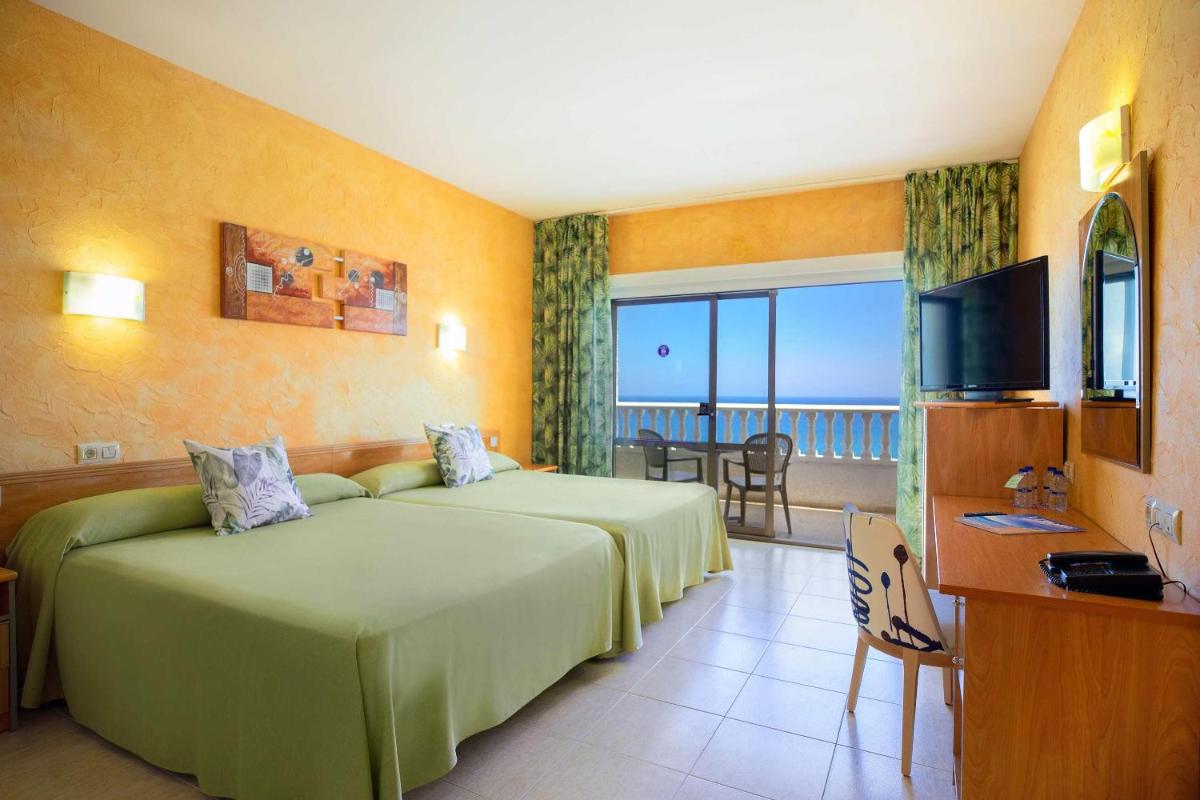 Cama o camas de una habitación en Hotel Servigroup La Zenia 4 Sup