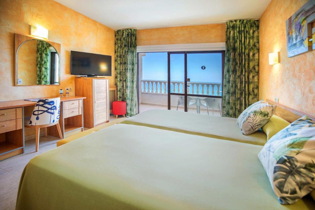 Cama o camas de una habitación en Hotel Servigroup La Zenia 4 Sup