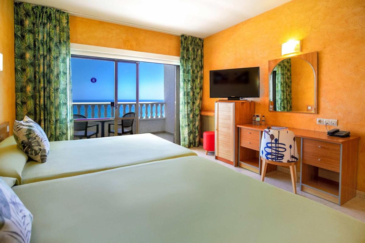 Cama o camas de una habitación en Hotel Servigroup La Zenia 4 Sup