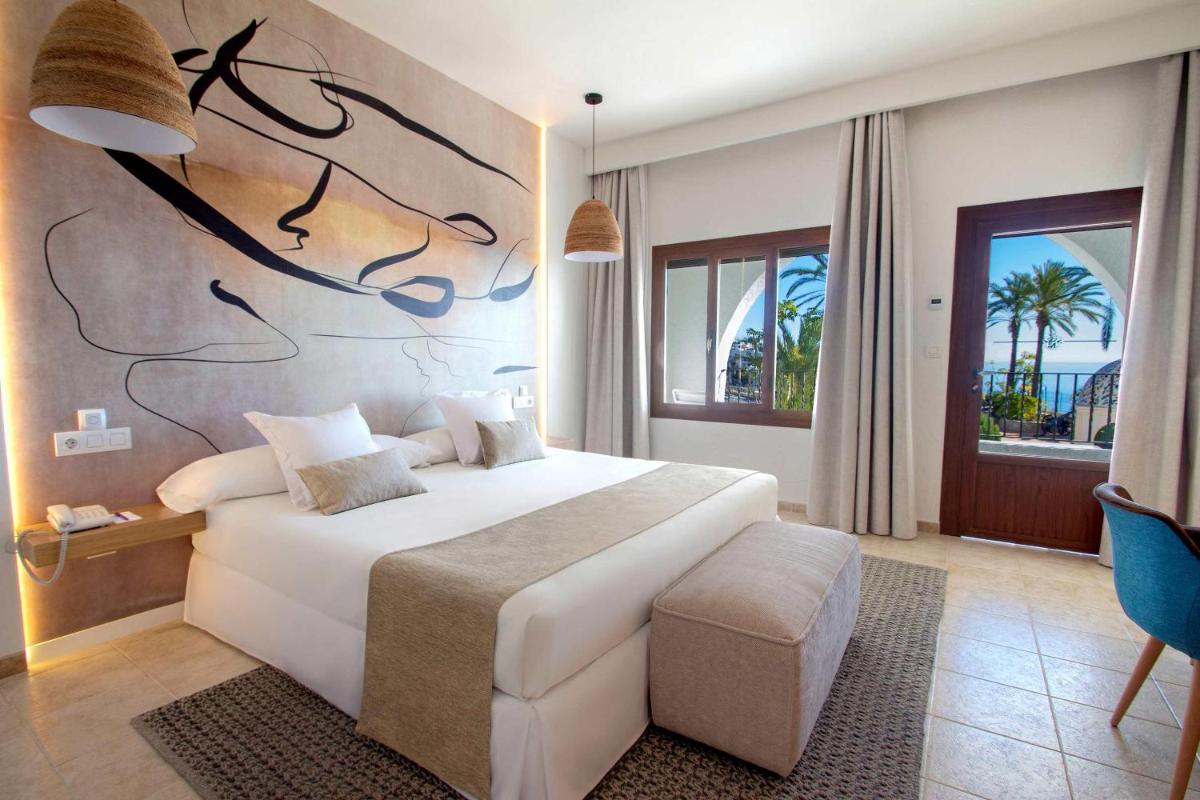 Cama o camas de una habitación en Hotel Servigroup Montíboli