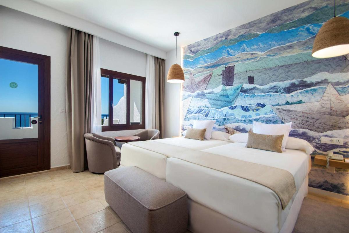 Cama o camas de una habitación en Hotel Servigroup Montíboli